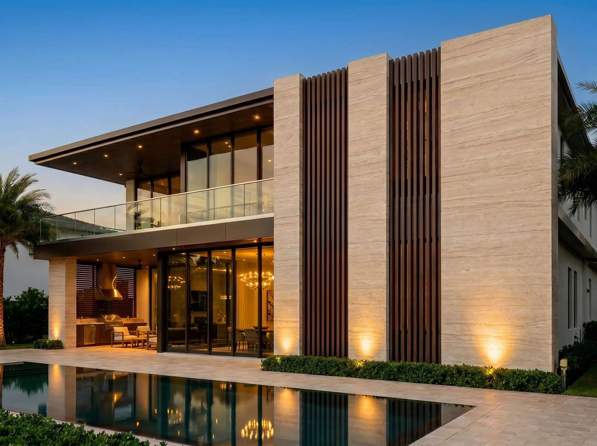 Modern travertine villa at dusk